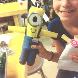 this kid aka JR Tinker Cadet made a minion from salvaged materials in Tinkertopia